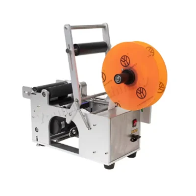 Universal Seal Automatic MT50 Round bottle Labeling Machine used in the Food,Beverage,Cosmetic,Pharmaceutical Industries